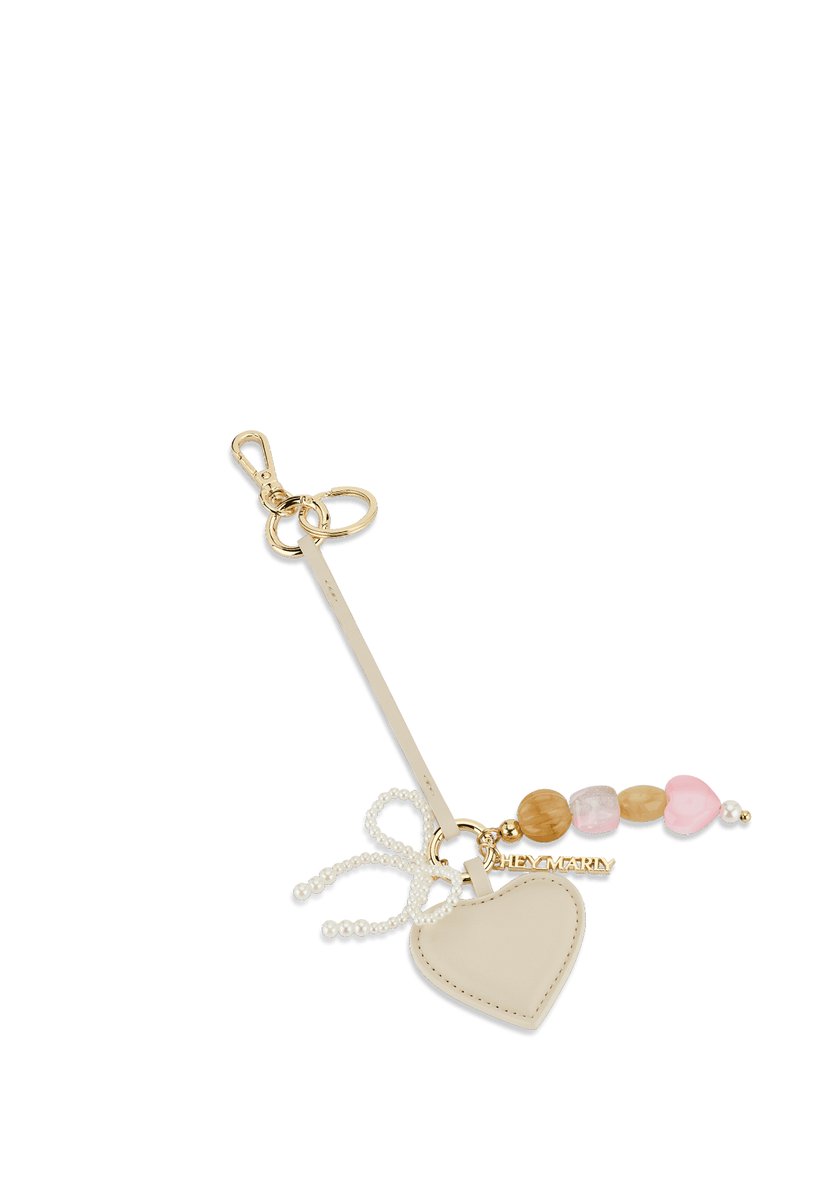 Frontalansicht auf neutralem Hintergrund des Produktes Heart & Pearls Charm in der Farbe Crema