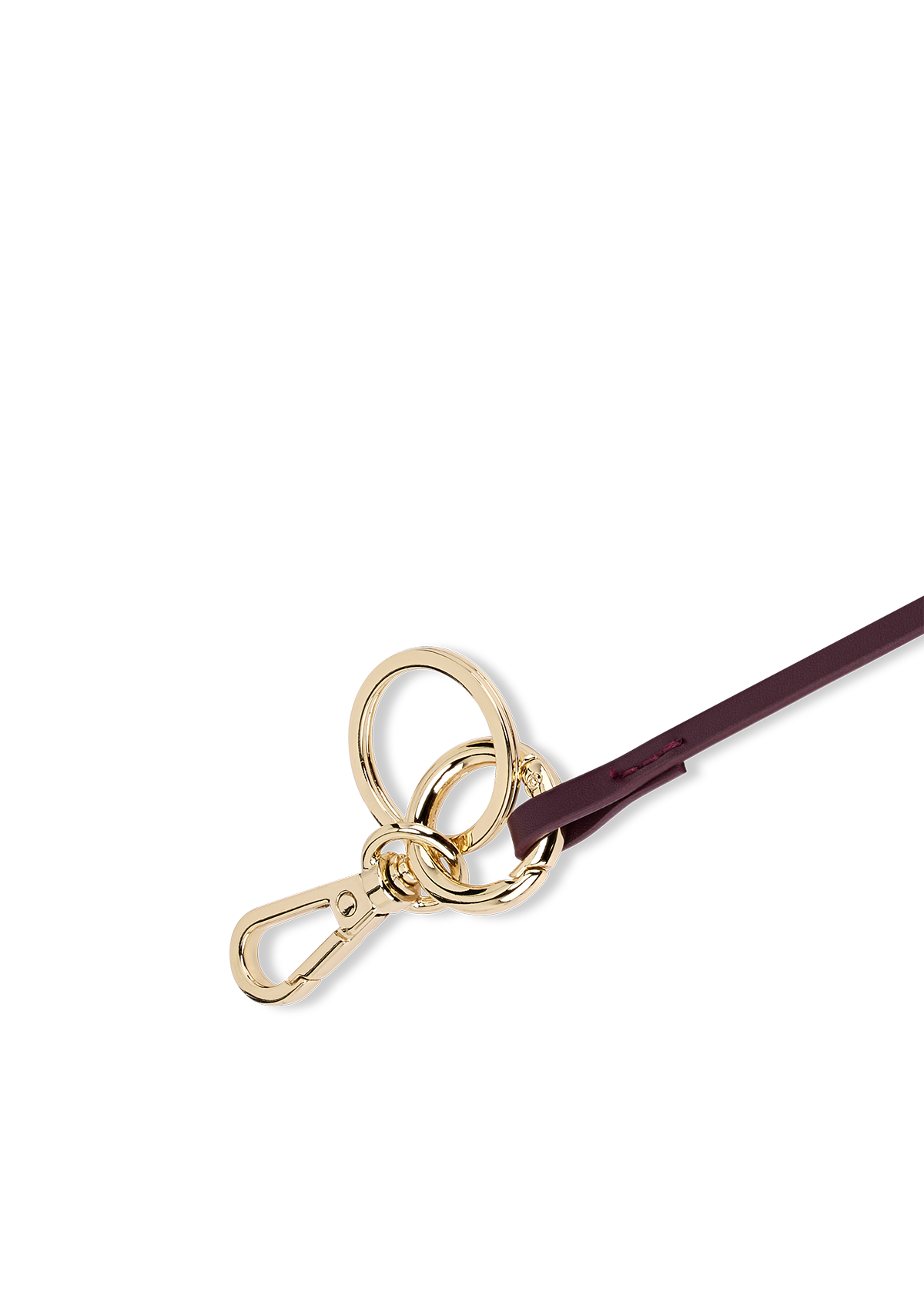 Seitenansicht auf neutralem Hintergrund des Produktes Best Buddy Charm in der Farbe Berry